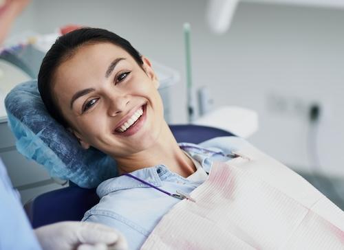 A young woman during a dental emergency consultation in Pampa TX